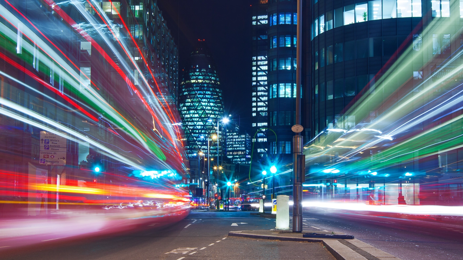 Long exposure image of financial district in London, UK, at night with illuminated buildings. Long exposure image of financial district in London, UK, at night with illuminated buildings.